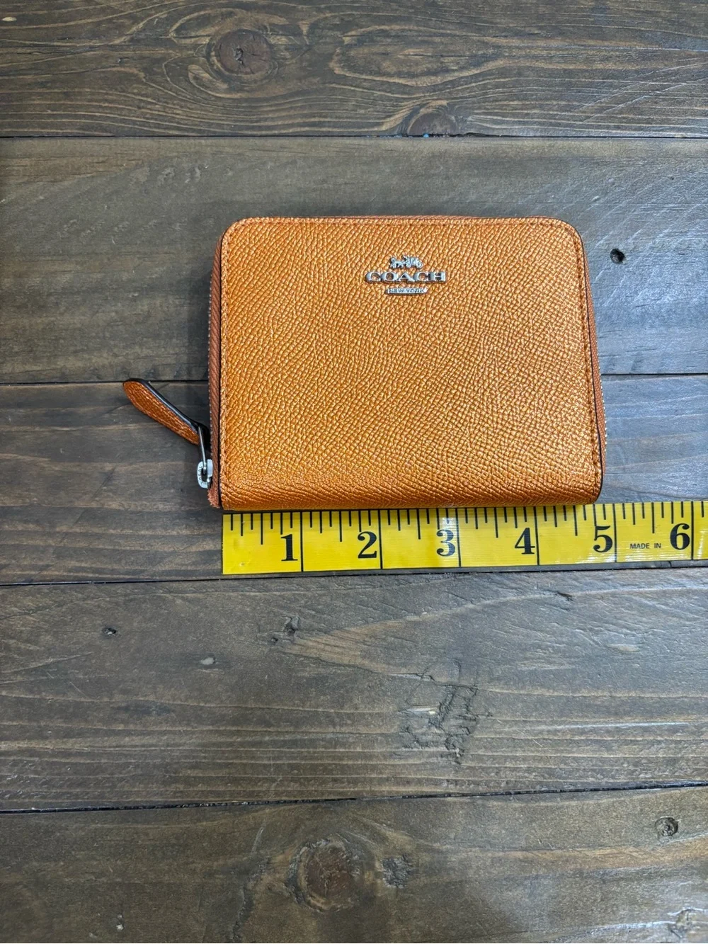 Coach Pebbled Leather Zip Wallet in Metallic Orange